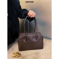 [Bolsa Xiaoyoujia] HOYOZI Primeira Camada de Couro Vegetal Curtido Commuter Sacola Estilo Feminino 2026 Novo Estilo Um O