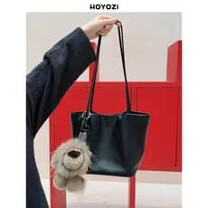 [Bolsa Xiaoyoujia] HOYOZI Bolsa balde de couro genuíno de um ombro Bolsa feminina Novo estilo leve nicho de luxo sensaçã