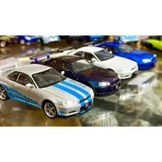 Miniatura Nissan skyline GTR R34 Escala 1:32 em metal c/ som e luz