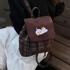 2025 novo estilo Retro caramelo cor mochila feminina xadrez nicho na moda All-Match camurça mochila de couro macio estud