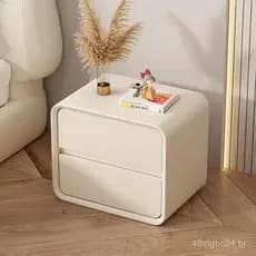 Mesa de cabeceira de couro estilo armário em cor creme, formato redondo, moderna e elegante, design criativo e inteligen
