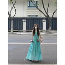 Seaside férias estilo oco estilingue saia longa vestido feminino verão Design sentir plissado solto grande bainha saia A