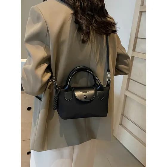 Bolsa bolsa feminina Casual Commuter saco feminino 2026 novo estilo leve náilon pano Crossbody saco do telefone móvel ni