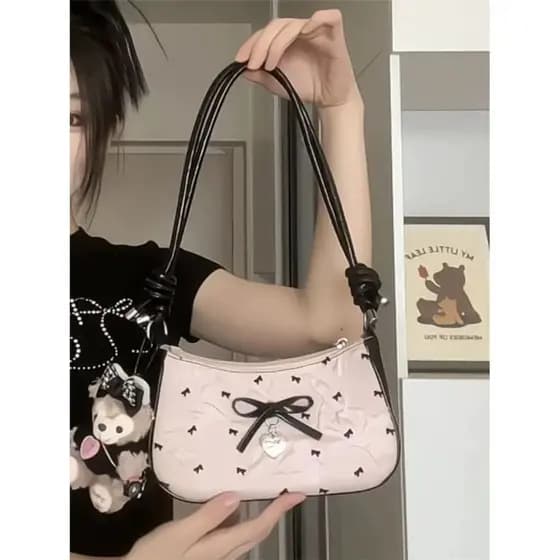 bolsa feminina bolsa transversal feminino Coreano nicho Bowknot axilas saco feminino 2026 verão bolsa Commuter bolsa de