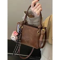 bolsa transversal feminino bolsa feminina High-End Retro Merad marrom pequeno saco feminino 2026 novo estilo outono inve