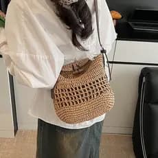 2025 verão novo estilo férias à beira-mar simples Casual saco de praia feminino mão-tecido All-match Cross-body balde sa