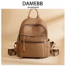 DAMEBB mochila feminina versão coreana cor sólida moda All-Match grande capacidade mochila de couro macio na moda luz lu