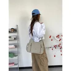 Versão coreana moda feminina bolsa mensageiro bolsa de ombro axila influenciador único Casual All-Match simples Multi-bo