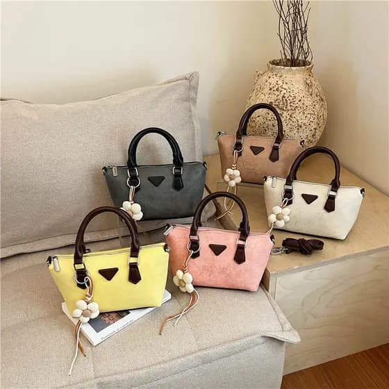 Bolsa feminina pequena, única e versátil, modelo novo de 2026, elegante e sofisticada, bolsa de mão em formato de almofa