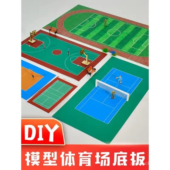 Cenário em miniatura de um edifício escolar modelo em uma mesa de areia, simulando um playground, campo de futebol, camp
