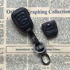 Adequado para Chevrolet caso chave do carro Aiweiou três-carro Cruz escudo fivela de couro genuíno controle remoto caso