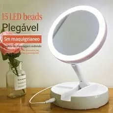 Espelho de maquiagem portátil de mesa com luz LED, ampliação de 10x e luz LED dobrável.