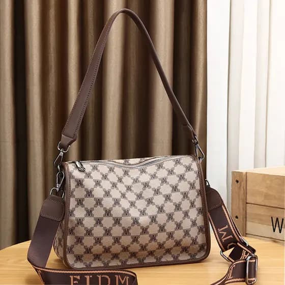 Bolsa Popular deste ano feminina 2026 novo estilo moda impressa bolsa de axilas de grande capacidade de banda larga Casu