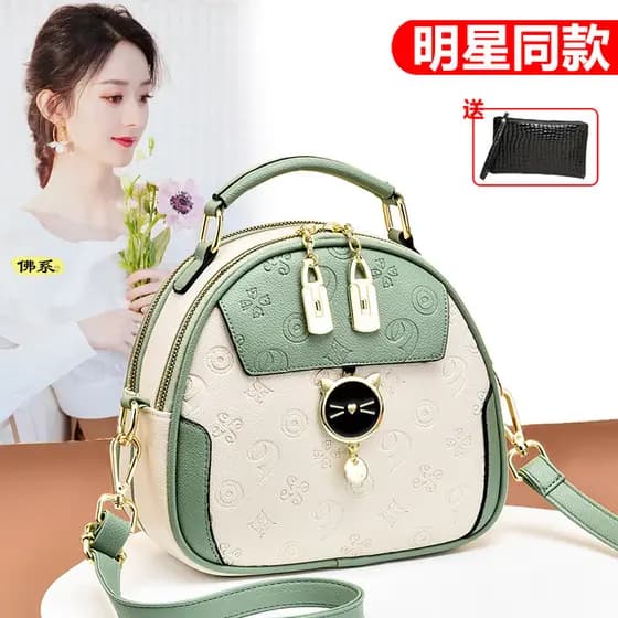 Bolsa feminina de couro macio bolsa pequena 2024 outono inverno novo estilo na moda moda All-Match pequena bolsa redonda