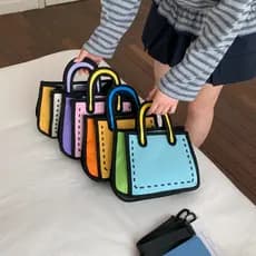 2026 Nova Bolsa Transversal Feminina Criativa Pequena Quadrada de Lona com Estampa de Desenho Animado 2D - Bolsa Casual