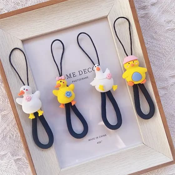 Desenhos animados pato amarelo caso de telefone cordão anel fivela corda menina telefone cordão Anti-perdido corda curta