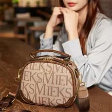 França MKDN bolsa feminina 2026 novo estilo moda couro genuíno pequena bolsa redonda textura um ombro Diagonal bolsa fem