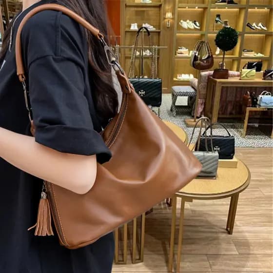 Francês MKDN saco de bolinho de couro novo estilo solto Retro Commuter saco de couro macio ombro saco do mensageiro