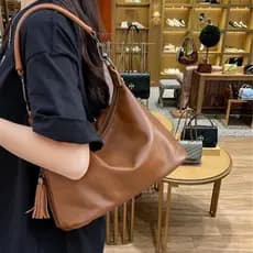 Francês MKDN saco de bolinho de couro novo estilo solto Retro Commuter saco de couro macio ombro saco do mensageiro