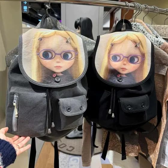 Estilo coreano início da primavera bonito dos desenhos animados rosto grande mochila do bebê nicho botão aba mochila fem