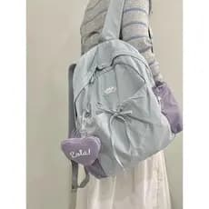 Mochila escolar júnior meninas do ensino médio mochila ins nicho grande capacidade viagem luz de alta aparência Commuter