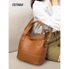 Bolsa balde de couro genuíno feminina 2026 novo estilo moda contraste cor primeira camada de couro bolsa mensageiro bols