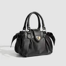 Bolsa plissada com fivela de coração feminina 2026 novo estilo nicho Commuter bolsa mensageiro de ombro