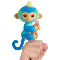 O novo macaco interativo "Fingerlings" de 2023 emite mais de 70 sons e reações ao ser tocado, versão leão azul, apresen