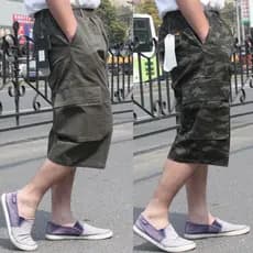 Roupas masculinas de verão novo estilo versão coreana calças cortadas masculinas casuais na moda Shorts de 7 pontos solt