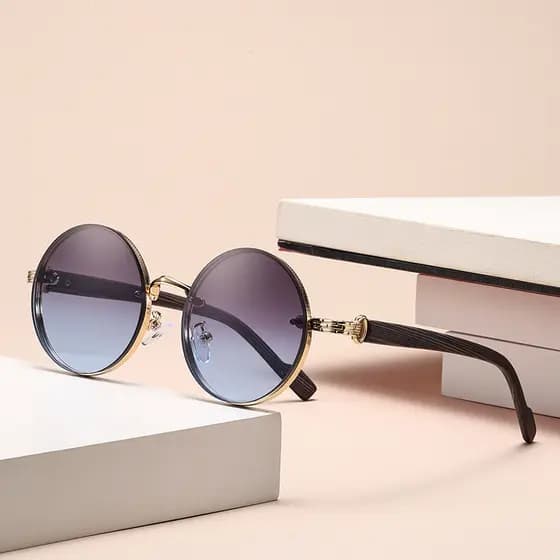Óculos de sol de armação redonda de Metal clássico americano exclusivo na moda High-End tiro de rua condução Anti-forte