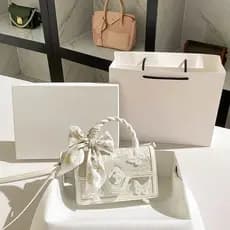 Bolsa de mão feminina com laço, design exclusivo francês, nova coleção 2026, bolsa quadrada pequena com trama torcida.