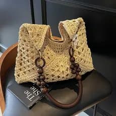 Bolsa de palha vazada estilo casual para mulheres, novo modelo 2026, bolsa de ombro para viagem, bolsa de praia.