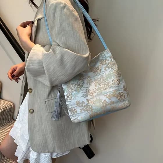 As mais recentes bolsas de estilo chinês são requintadas e versáteis, incluindo novas bolsas femininas de grande capacid