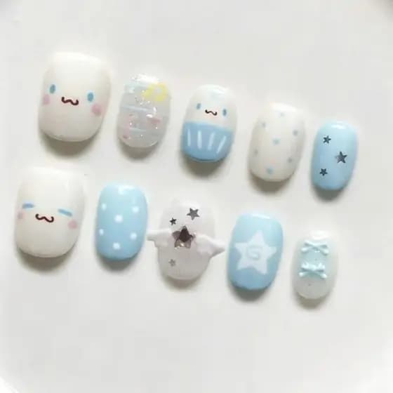 Unhas postiças semi-artesanais Cinnamoroll azul gelo e branco com asas e laços 3D, claras e vibrantes, para um visual jo
