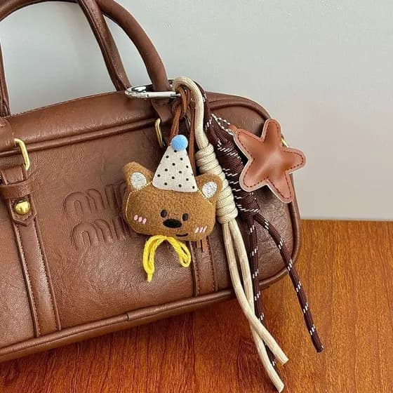 Urso de pelúcia escalada corda mão corda dos desenhos animados boneca chaveiro miu gravata saco pendurado boneca pingent