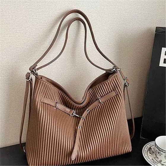 Moda retrô bolsa de grande capacidade feminina 2025 outono Commuter arco bolsa Diagonal de um ombro