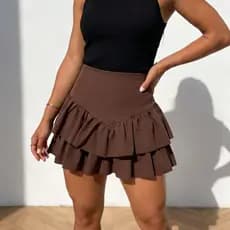 Saia feminina babados em camada cintura alta zíper lateral elegante lançamento verão 2026 moda gringa copa do mundo