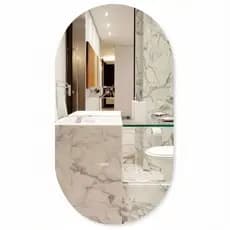 Espelho decorativo de vidro oval de 70 x 30cm, ideal para decoração