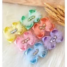 Boutique de luxo. Laço para festa. laço luxuoso. laço para meninas. laço infantil. laço para bebê. laço temático.