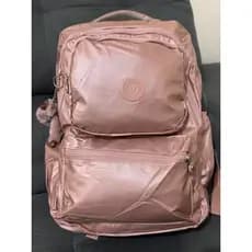 Mochila Escolar Metalizada Grande Impermeável Trabalho Faculdade com chaveiro Macaquinho