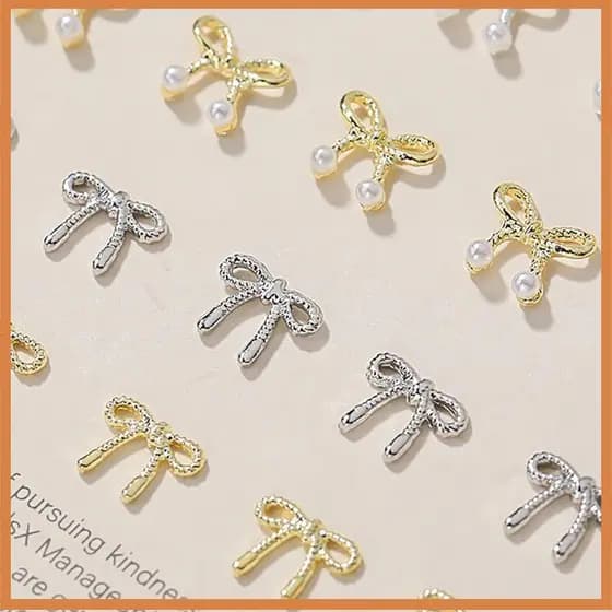 [BG] 10 Pcs 3D Prata Ouro Bowknot Em Forma De Prego Encantos Liga De Metal Nail Art Strass Manicure Jóias Para DIY Acess