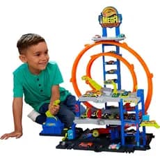 Kit Pista Hot Wheels Mega Garagem Mattel. Conjunto com elevador e estacionamento para vários veículos. JBM74