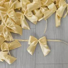 Laço lacinho cetim amarelo ouro com amarração fita N°5 decorativo mimo presente páscoa