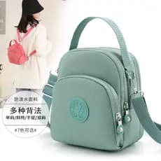 Bolsa feminina pequena Nylon Tiracolo Transversal Impermeável Vira Mochila mini