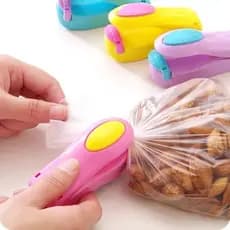 Mini Seladora Portátil Máquina Plástico Pilha Com Imã Selar