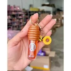 Lip Gloss de Mel Com Chaveiro Dupe Lua e neve