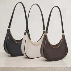 Bolsa feminina meia lua de ombro media minimalista moderna e elegante corrente dourada para o dia a dia