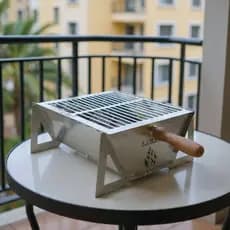 Churrasqueira a Carvão Portátil em Inox Desmontável Ideal Para Mesa, Sacada, Pesca e Camping