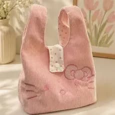 Mini bolsa bordada personagens Hello Kit rosa