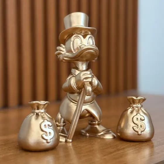 Tio Patinhas com Sacos de Dinheiro Action Figure Colecionável e Presente
